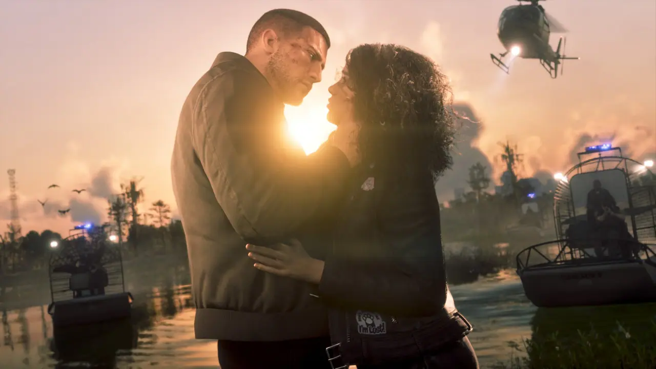 Jason and Lucia holding each other at sunset in a swamp as police airboats and a helicopter close in