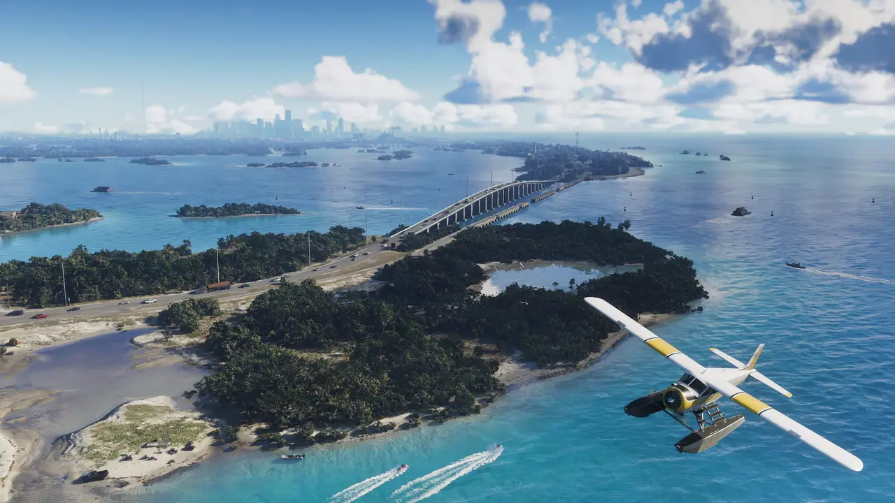 A seaplane flying over the Leonida Keys, islands joined by a long bridge across turquoise water