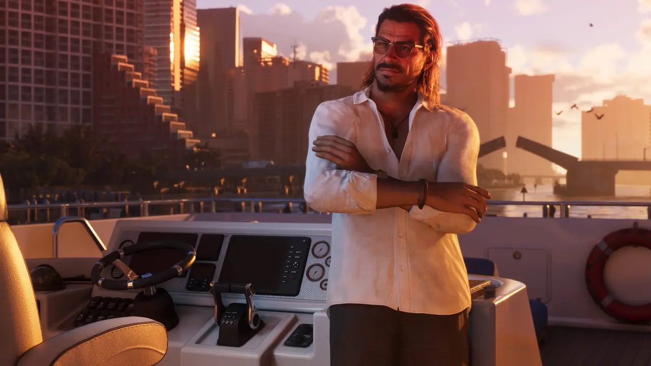 Raul Bautista with his arms crossed on a yacht deck at sunset, Vice City towers behind him
